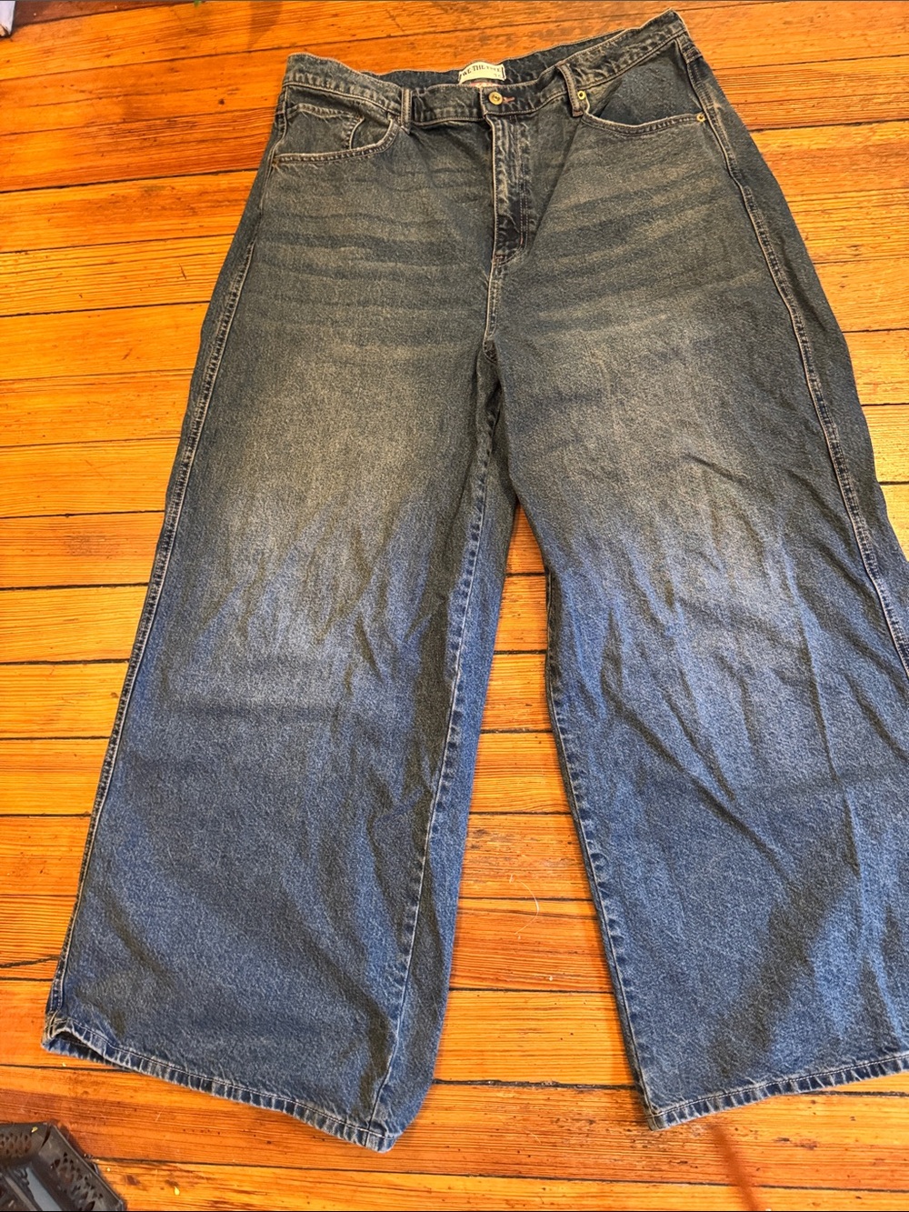 We The Free dark blue ultra wide leg jeans with brass button